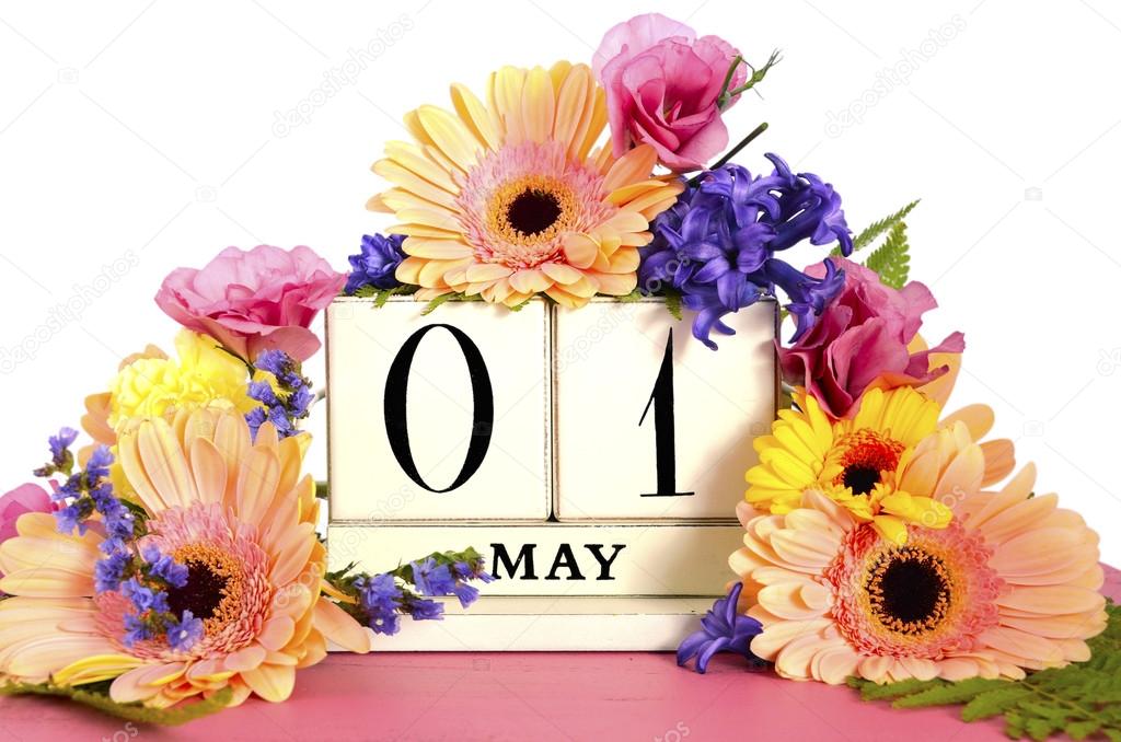 Happy May Day calendar with flowers. 