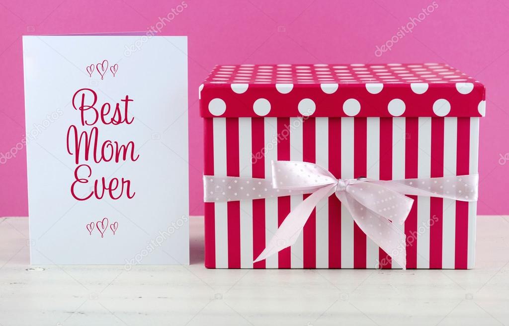 Happy Mothers Day pink and white gift with greeting card. 