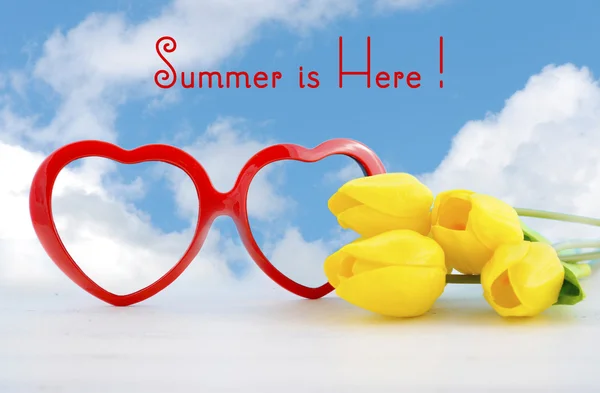 Summer Is Here concept with red heart shape sunglasses — Stock Photo, Image