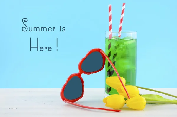 Summer Is Here concept with red heart shape sunglasses — Stock Photo, Image