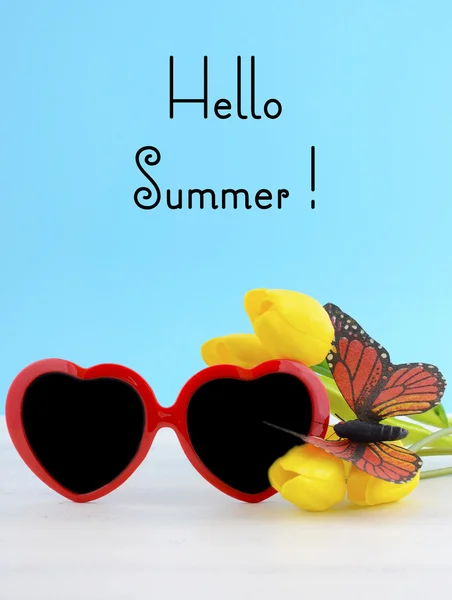 Summer Is Here concept with red heart shape sunglasses — Stock Photo, Image