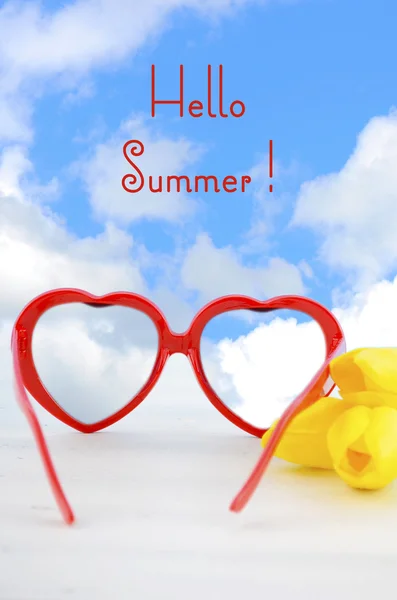 Summer Is Here concept with red heart shape sunglasses — Stock Image Summer Is Here concept with red heart shape sunglasses Stock Image