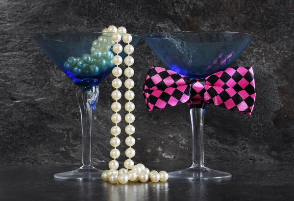 Lets Party male and female cocktail glasses. — Stock Photo, Image