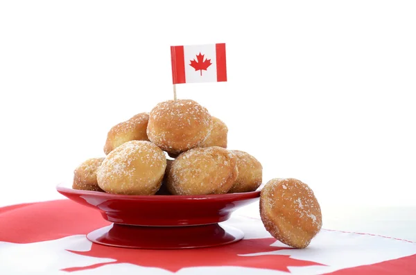 Canada Day celebration with plate of donut holes. — Stock Photo, Image