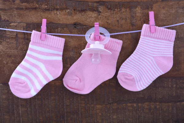 Es una chica rosa bebé calcetines — Foto de Stock