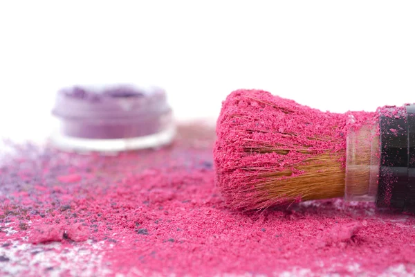 Pink and purple makeup powder and brush. — Stock Photo, Image