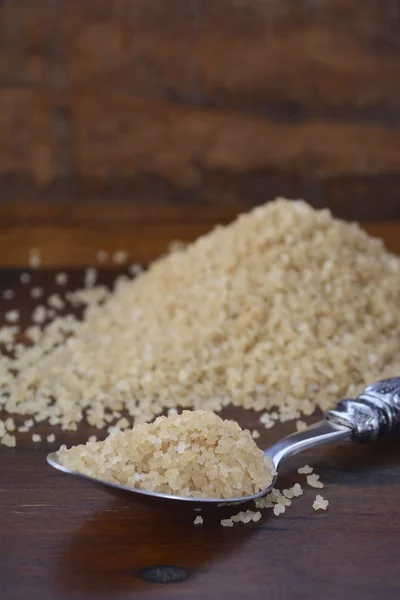 Cucharada de cristales de azúcar de café —  Fotos de Stock