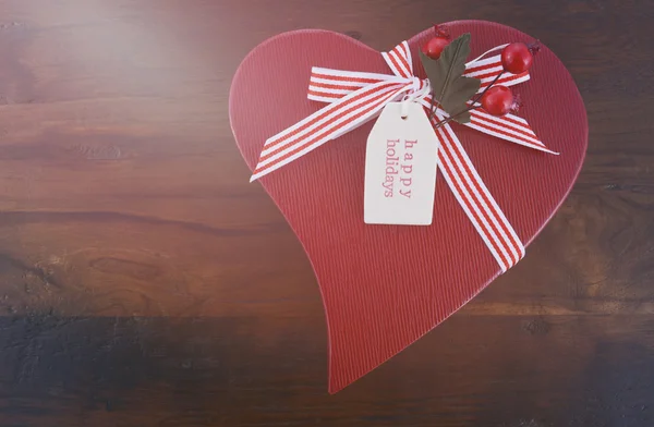 Vintage style red heart shape Christmas gift — Stock Photo, Image