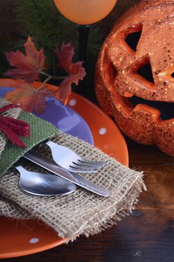 Happy Halloween table with Jack O Lantern pumpkin