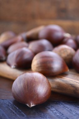 Chestnuts on Rustic Wood Table