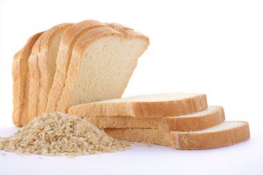 Loaf Rice Sourdough bread with raw brown rice.