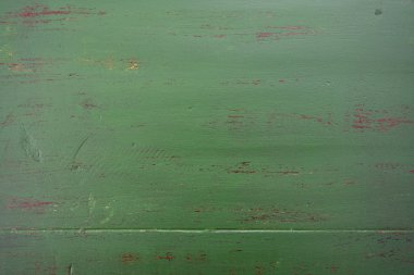 Dark green rustic wood background.