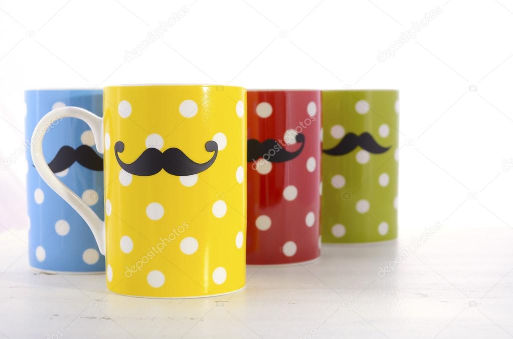 Colorful coffee mugs with mustaches.