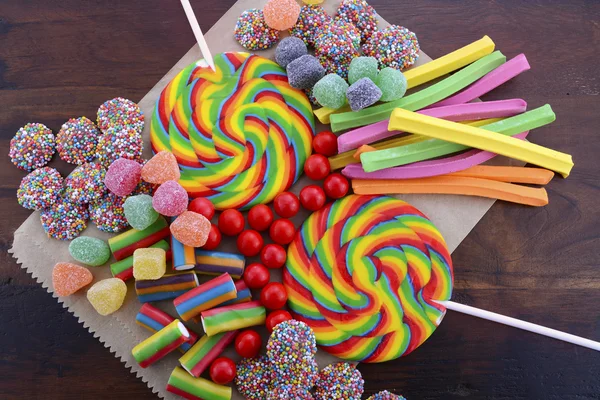 Assorted candy with brown paper bag. — Stok fotoğraf