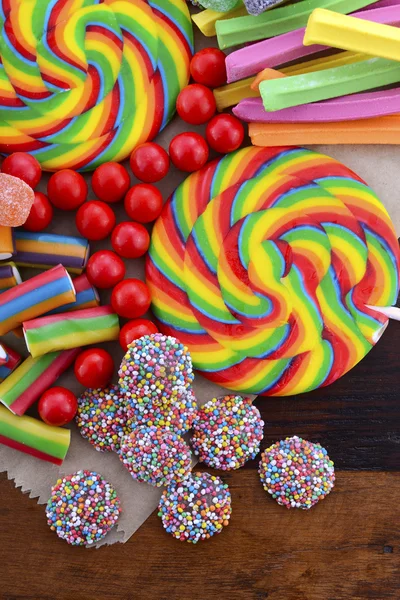 Assorted candy with brown paper bag. — Stockfoto