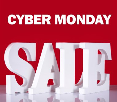 Cyber Monday Wooden Sale Letters on Red Background.