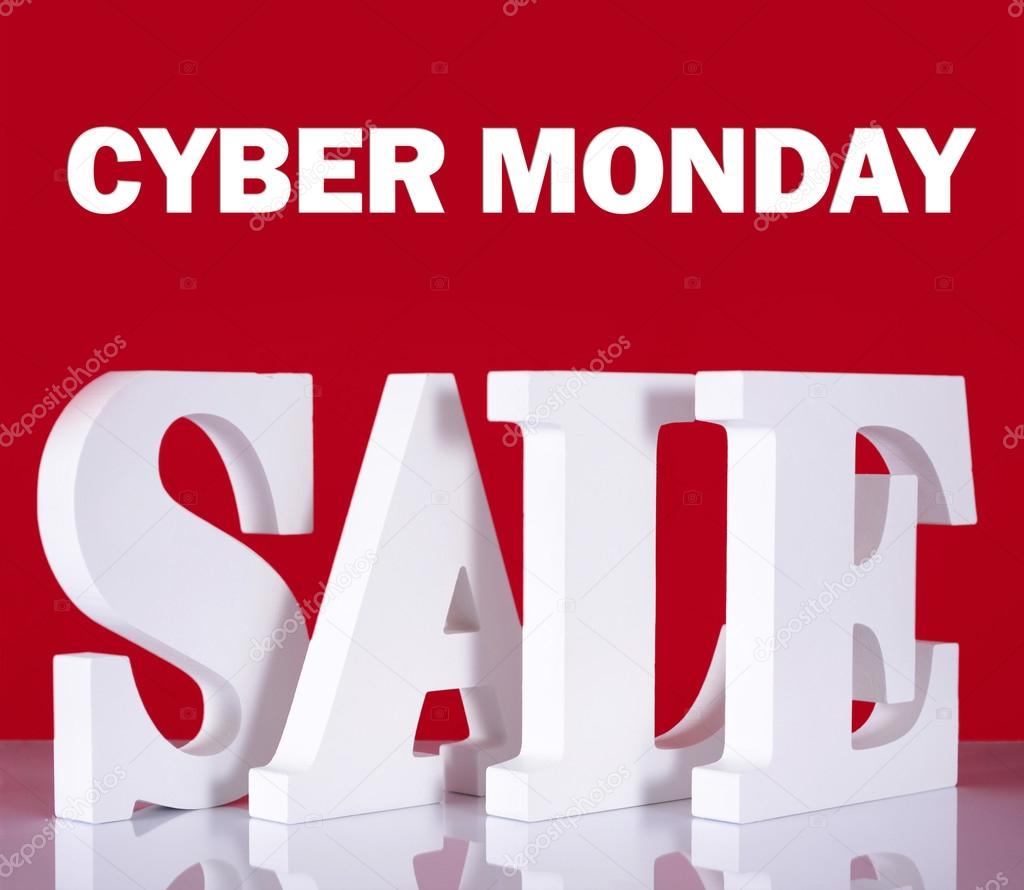Cyber Monday Wooden Sale Letters on Red Background.