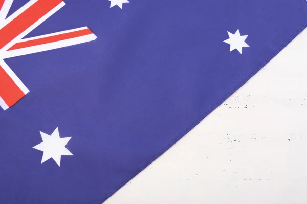 Австралийский флаг на столе из белого дерева — стоковое фото