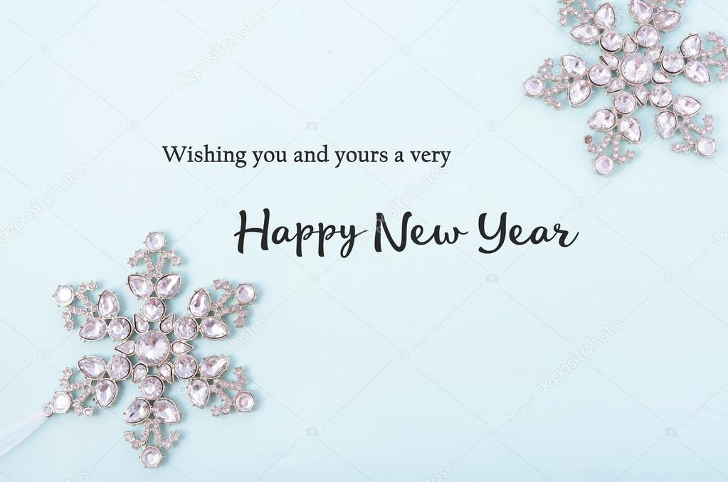 Happy New Year Greetings on Decorated Background.