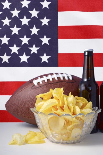 American football with beer and chips. — Stock Photo, Image