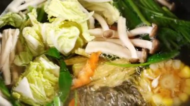 Shabu Mixed Vegetable Hot Pot It's a type of boiled food.Mixed Vegetable Suki Hot Pot Boil the vegetables in boiling water. Put the vegetables in the hot pot.Cook the broth, add the mushrooms and corn to the hot pot. Put the vegetables in a hot pot.