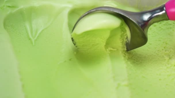 Sherbet Ice Cream Scooped Out Container Spoon Front View — Video