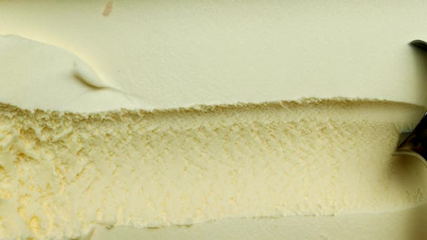 Close Texture Vanilla Ice Cream Creates Small Waves Scooping Ice — Stok video