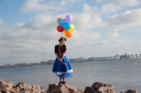 Meisje met ballonnen — Stockfoto