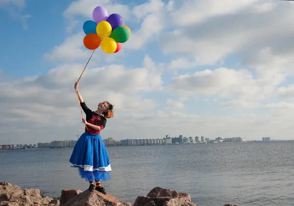 Flicka med ballonger — Stockfoto