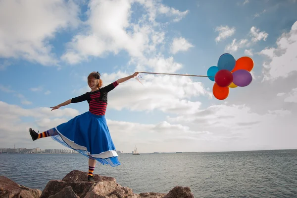 Girl with balloons — Stock Photo, Image