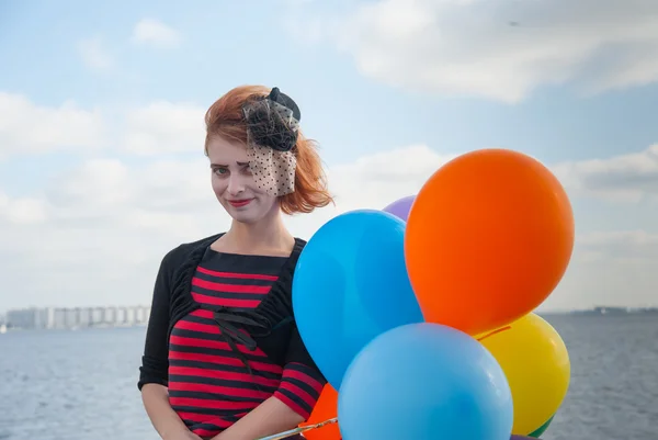 Girl with balloons — Stock Photo, Image