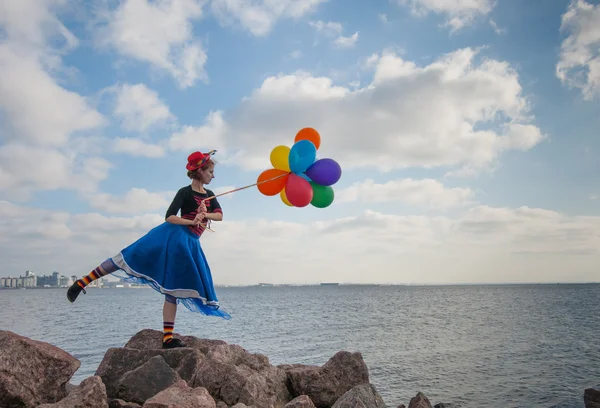 Flicka med ballonger — Stockfoto