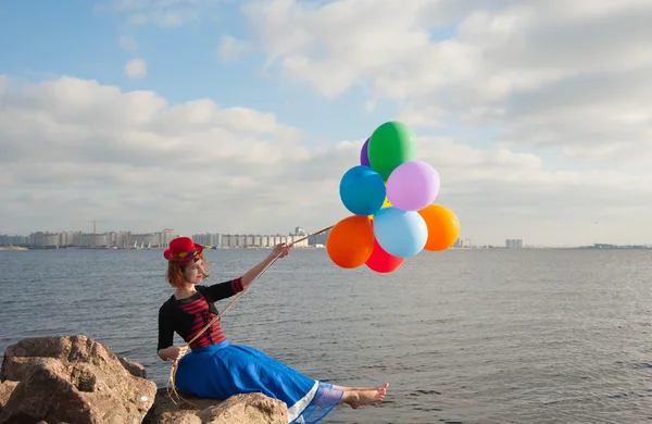 Vrouw met ballen — Stockfoto