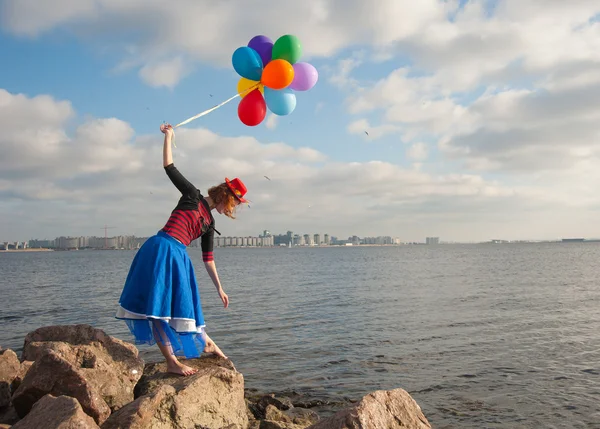 Woman with balls — Stock Photo, Image