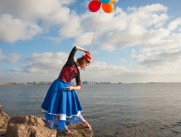 Woman with balls — Stock Photo, Image