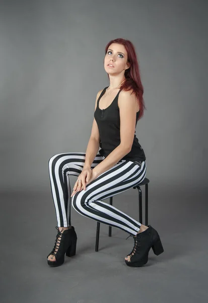 Chica en pantalones a rayas —  Fotos de Stock