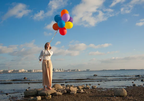 Menina livre com bolas — Fotografia de Stock