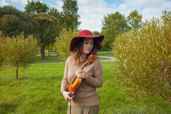 Woman with a violin — Stock Photo, Image