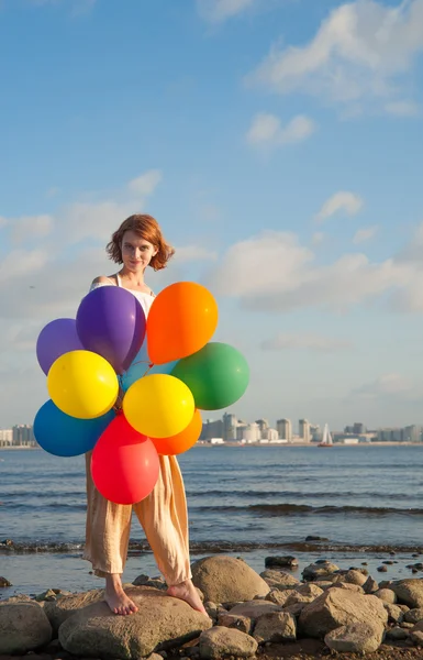 Menina livre com bolas — Fotografia de Stock