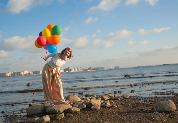 Menina livre com bolas — Fotografia de Stock