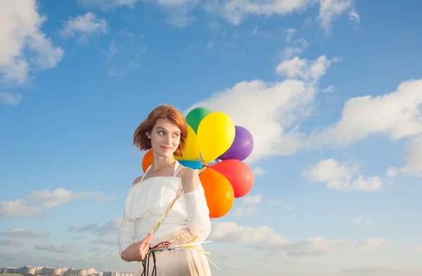 Girl with balloons — Stock Photo, Image