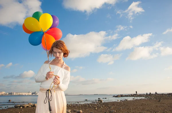 Girl with balloons — Stock Photo, Image