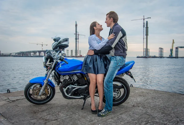 Young couple on a motorcycle — Stock Photo, Image