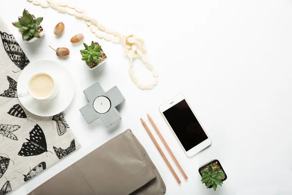 Overhead flat lay collection of desktop fashion and home items — Stock Photo, Image