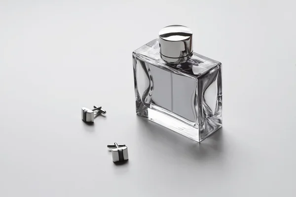 Horizontal mens cologne and cufflinks — Stock Photo, Image