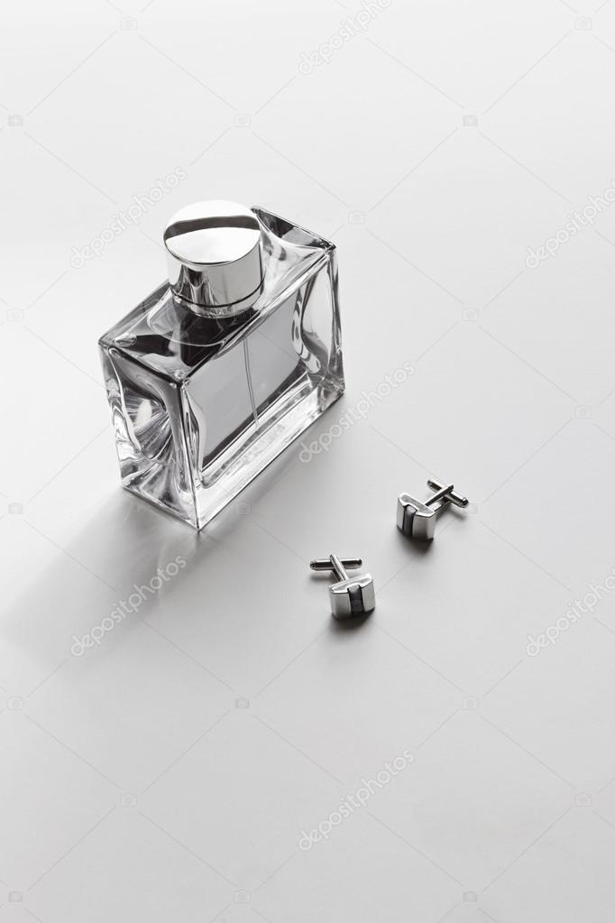 Vertical mens cologne and cufflinks