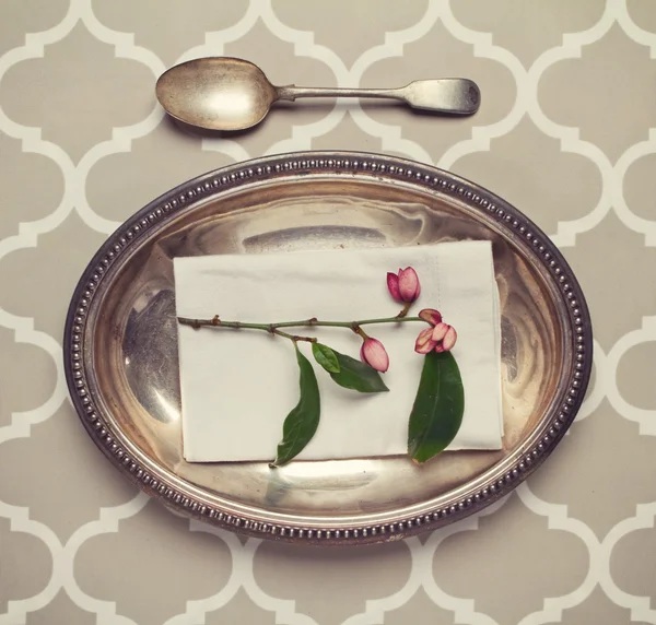 Vintage silver platter and spoon place setting — Stock Photo, Image