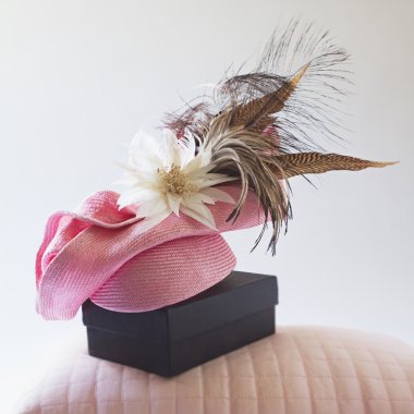 Pink fashion races hat with flower and feathers clipart