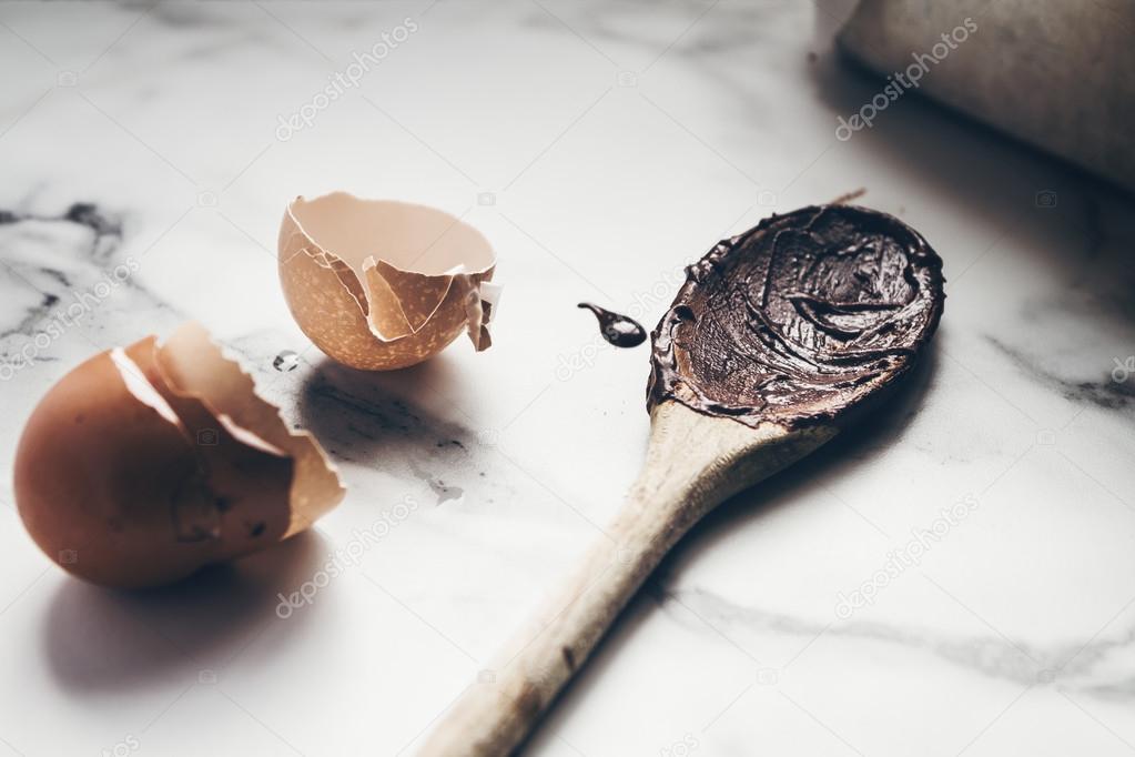 Close up of chocolate mixture on mixing spoon