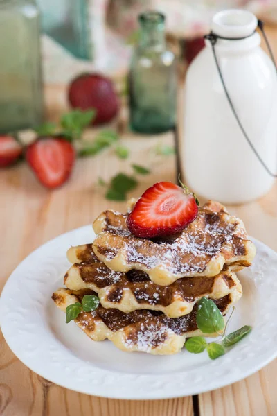 Belgian waffles with strawberries and mint — Stock Photo, Image